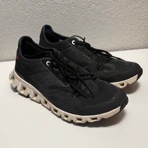 On Running Women's Black Sneakers with white Sole